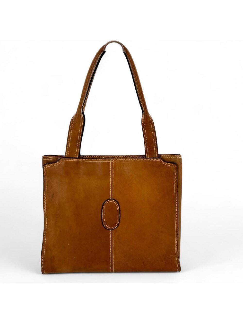 Tan leather tote bag with white stitching